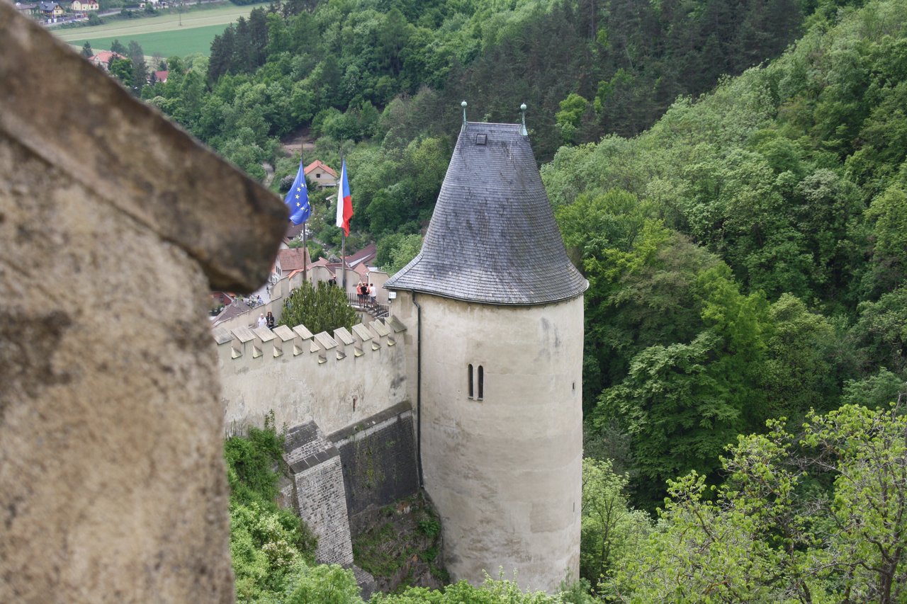 A view of the castle from high up, with the flags of Europe and the Czech Republic