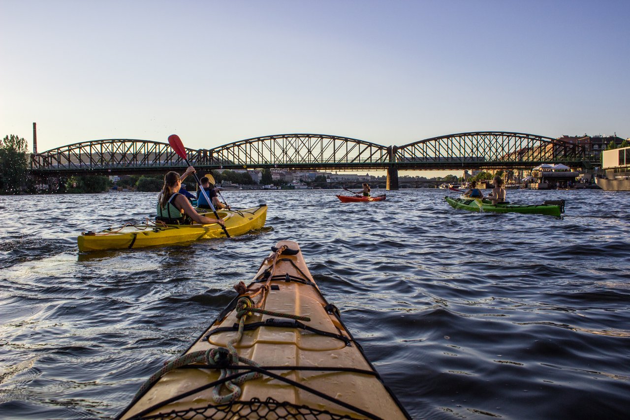 As seen from a kayak, there are three other kayaks